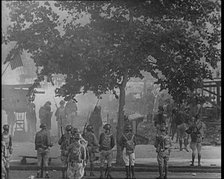 U.S Army Soldiers Confronting Protesting Soldiers With Tear Gas and Bayonets To Disperse..., 1932. Creator: British Pathe Ltd.