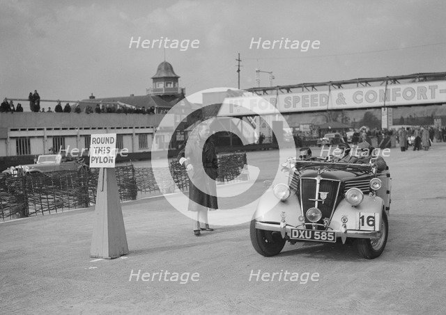 Renault open tourer competing in the JCC Rally, Brooklands, Surrey, 1939. Artist: Bill Brunell.