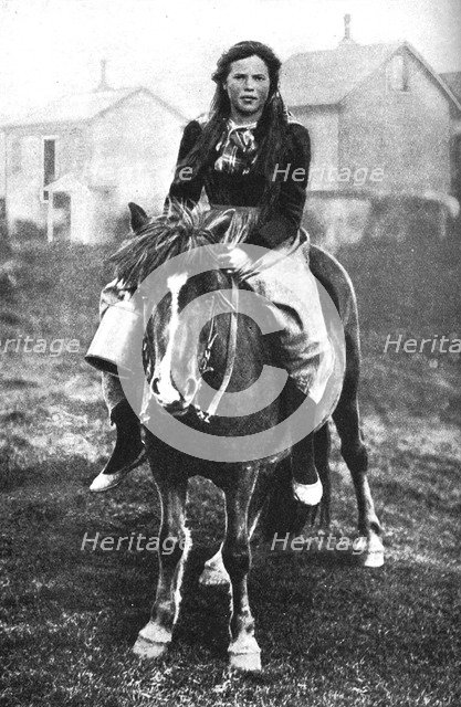A milkmaid on her morning round, Iceland, 1922. Artist: Unknown