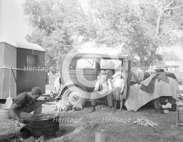 Migratory family in auto camp, California, 1936. Creator: Dorothea Lange.