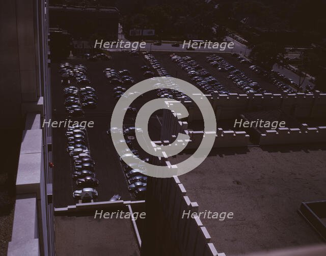 Looking down on a parking lot from the rear of the Fisher Building, Detroit, Mich., 1942. Creator: Arthur S Siegel.