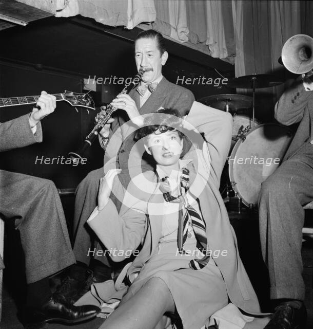 Portrait of Pee Wee Russell and Linda Keene, Eddie Condon's, New York, N.Y., 1946. Creator: William Paul Gottlieb.