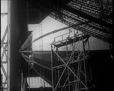 A Partially Constructed R 38 Airship Sitting in a Hangar, 1921. Creator: British Pathe Ltd.