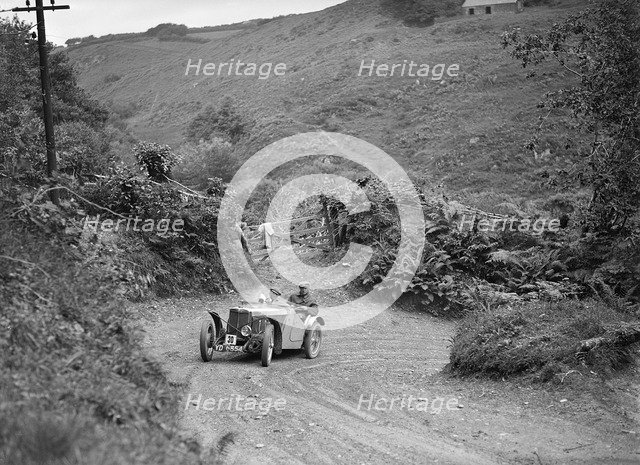 1933 MG J2 taking part in a motoring trial, late 1930s. Artist: Bill Brunell.