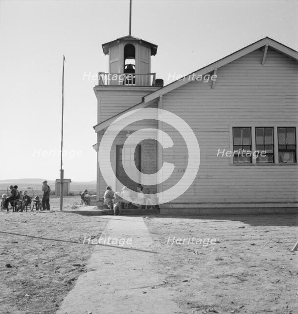 Lincoln Bench School and yard, near Ontario, Malheur County, Oregon, 1939. Creator: Dorothea Lange.