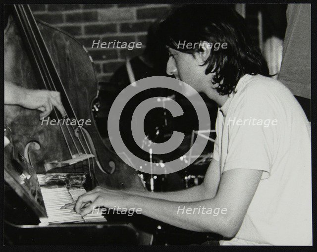 Pianist Leon Greening playing at The Fairway, Welwyn Garden City, Hertfordshire, 8 June 2003. Artist: Denis Williams