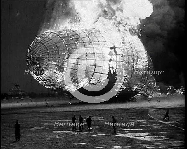 The German Airship, the Hindenburg, its Rear Half Destroyed And Obscured By Smoke With..., 1937. Creator: British Pathe Ltd.