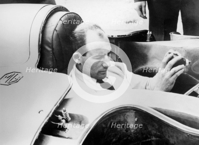 Stirling Moss in the MG EX181, 1957. Artist: Unknown