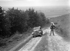 1935 Hillman Minx 1185 cc competing in a Talbot CC trial. Artist: Bill Brunell.