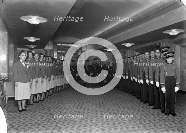 Uniformed staff of the Odeon cinema, Leicester Square, London, 1937. Artist: J Maltby