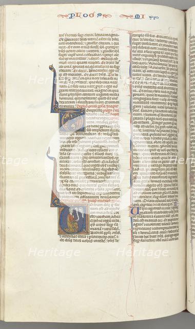 Fol. 358v, Micah, historiated initial V, Micah kneeling, bust of God above, c. 1275-1300. Creator: Unknown.