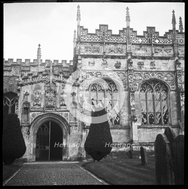 Unidentified church with a highly decorated porch and perforated parapet, England, 1940-1962. Creator: Ethel Booty.