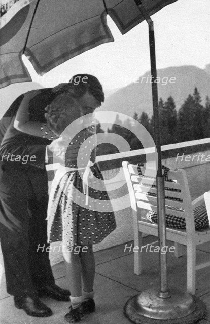 A little girl visits the Führer at Obersalzberg, Bavaria, Germany, 1936. Artist: Unknown