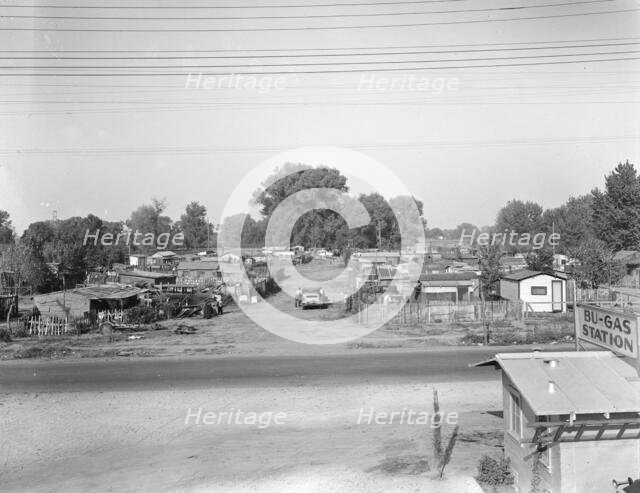 Migrant winter camp on outskirts of Sacramento, California, 1936. Creator: Dorothea Lange.