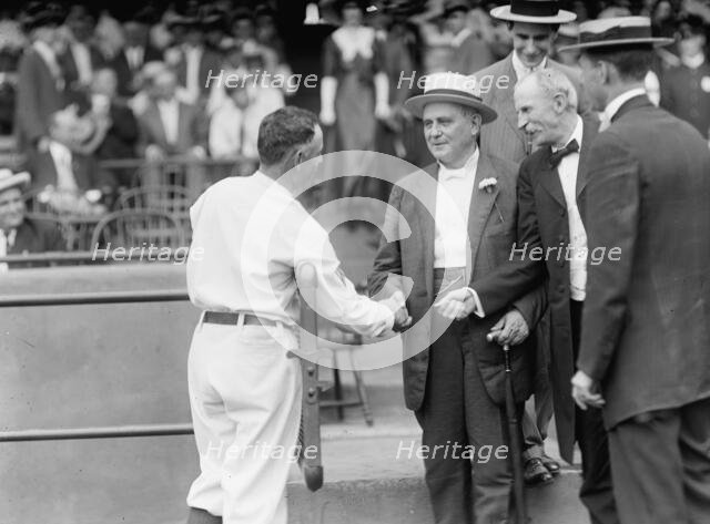 Baseball, Professional, Champ Clark, Shaking Hands with Clark Griffith, 1912. Creator: Harris & Ewing.