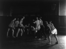 Male students playing basketball, Western High School, Washington, D.C., (1899?). Creator: Frances Benjamin Johnston.