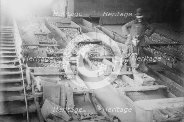 Miners among coal boxes, S. Wilkes-Barre, PA., 1912. Creator: Bain News Service.