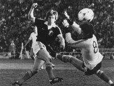 Kenny Dalglish (b1951) scoring against Holland during the 1978 World Cup in Argentina. Artist: Unknown
