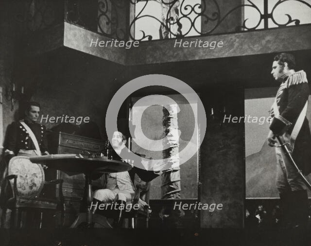 Man at table with bottle, 1938. Creator: Unknown.
