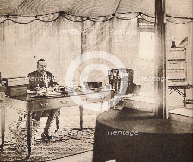 'King George with his pet parrot', 1936.  Artist: Unknown.