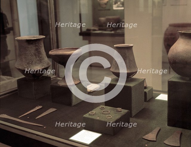 Grave goods of the archaeological site of El Argar (Almeria): well-crafted ceramic pieces, black …