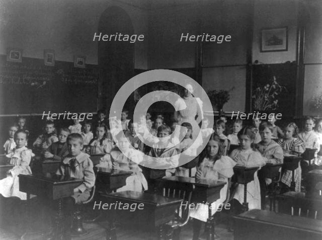 Classroom scenes in Washington, D.C. public schools: general classroom scenes, 1st Division, (1899?) Creator: Frances Benjamin Johnston.