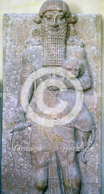Assyrian relief of Gilgamesh and a lion. Artist: Unknown