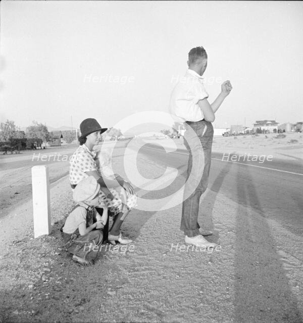 Oklahoma farm family on highway between Blythe and Indio - self-resettlement in California., 1936. Creator: Dorothea Lange.