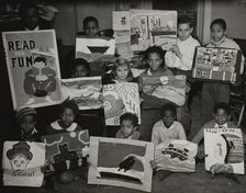 Flatbush art students showing examples of their work, 1935. Creator: Unknown.