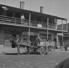 Street scene in the Negro section, Jacksonville, Florida, 1943. Creator: Gordon Parks.