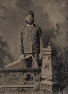 Carpenter, Standing Behind a Decorative Balustrade, Holding a Square, 1870s. Creator: Unknown.