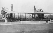 A racecourse stand wrecked by suffragettes in 1913. Artist: Unknown