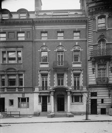 Four-story townhouse with curved pediment, possibly New York, N.Y., between 1900 and 1910. Creator: William H. Jackson.