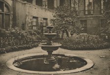 'Ancient Mulberry Tree and Fountain in the Garden of Drapers' Hall', c1935. Creator: Joel.