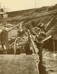 'A Diver With Euphonium and Swords from the German "Kaiser" Scuttled at Scapa', c1930. Creator: Unknown.