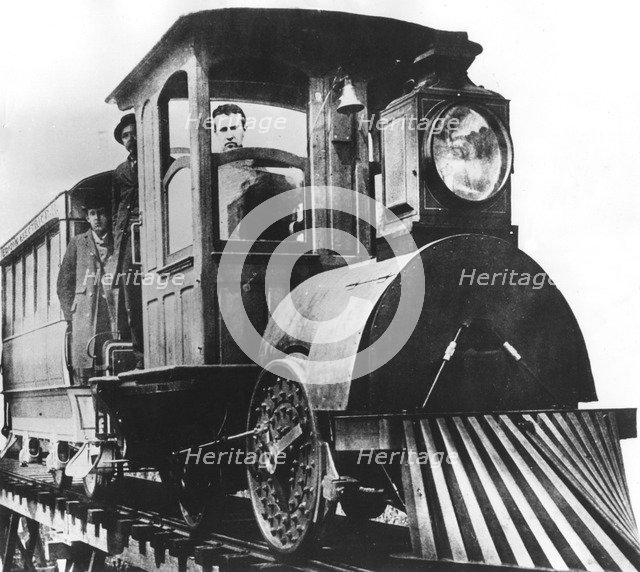 American inventor Thomas Alva Edison on board an electric railroad, 1892. Artist: Unknown