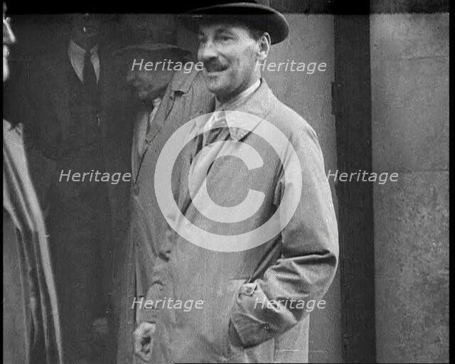 Clement at tlee Standing Outside a Building, 1930s. Creator: British Pathe Ltd.