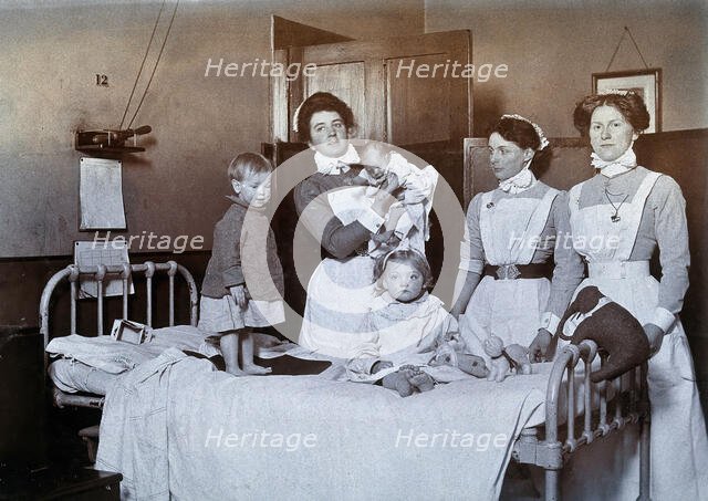 St Bartholomew's Hospital, London: nurses and children in casualty, c1890. Creator: Unknown.