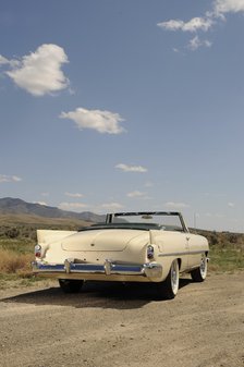 Dual Ghia 1957. Artist: Simon Clay.