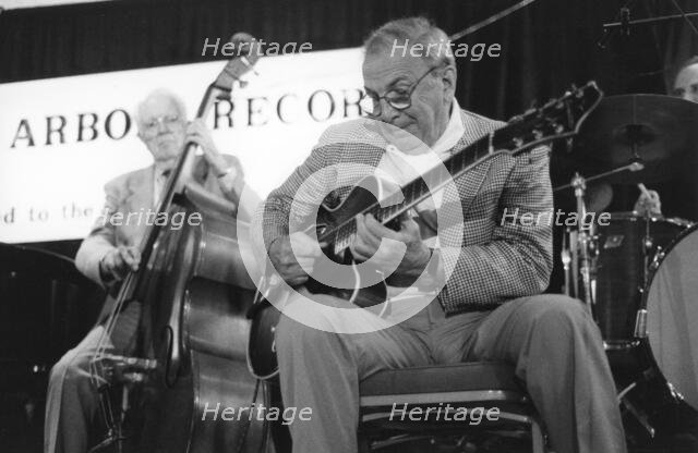 Bucky Pizzarelli, The March of Jazz, Clearwater Beach, Florida, USA, 1997. Creator: Denis Williams.