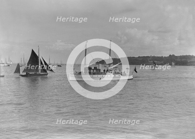 The motor yacht 'Silver Cloud' under way, 1920. Creator: Kirk & Sons of Cowes.