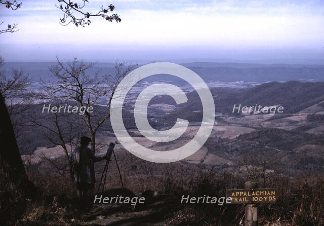 A woman painting a view of the Shenandoah Valley...entrance to the Appalachian Trail, Va, ca. 1940. Creator: Jack Delano.