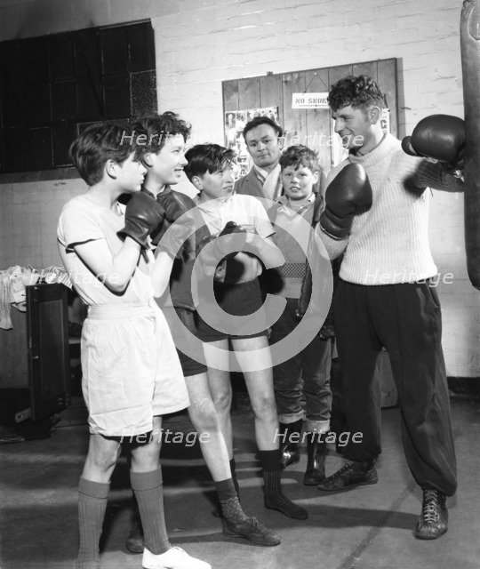 Boxing training at Horden Colliery gym, Sunderland, Tyne and Wear, 1964.  Artist: Michael Walters