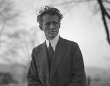 Portrait photograph of Arnold Genthe taken outdoors, between 1911 and 1942. Creator: Arnold Genthe.