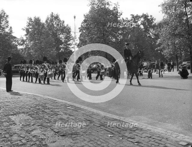 Guards' band on the march, London, c1955. Creator: Arthur Charles Kirby Ware.