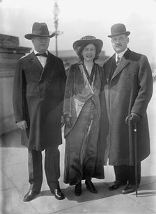 Bird Segle McGuire with Rep. J.S. Davenport, left, and Mrs. McGuire, 1913. Creator: Harris & Ewing.