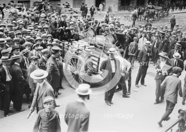 Loading gold for shipment abroad, between c1910 and c1915. Creator: Bain News Service.