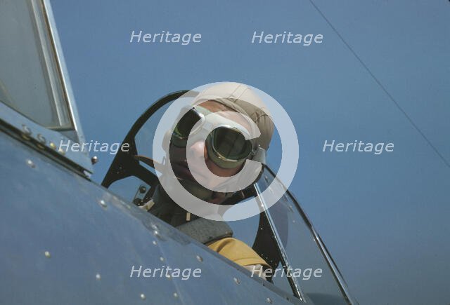 Marine lieutenant, glider pilot in training, ready for..., at Page Field, Parris Island, S.C., 1942. Creator: Alfred T Palmer.