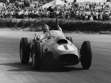 Peter Collins celebrates with lap of honour in Ferrari, 1958 British GP. Creator: Unknown.