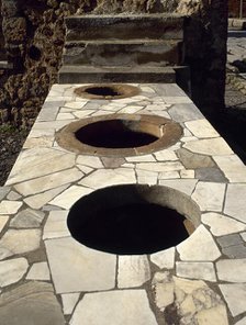 Marble-covered counter, Thermopolium, Via Consolare, Pompeii, Italy, 2002. Creator: LTL.